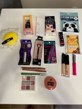 18 piece makeup lot, all new in packaging.